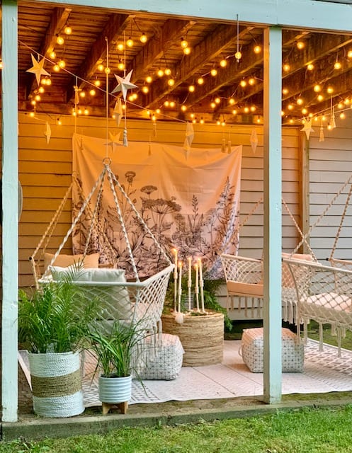 under deck sitting space featuring hammock chairs. 