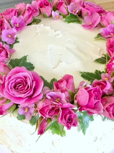 close up of fresh flowers on a cake
