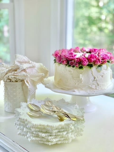 side view of cake with fresh flowers