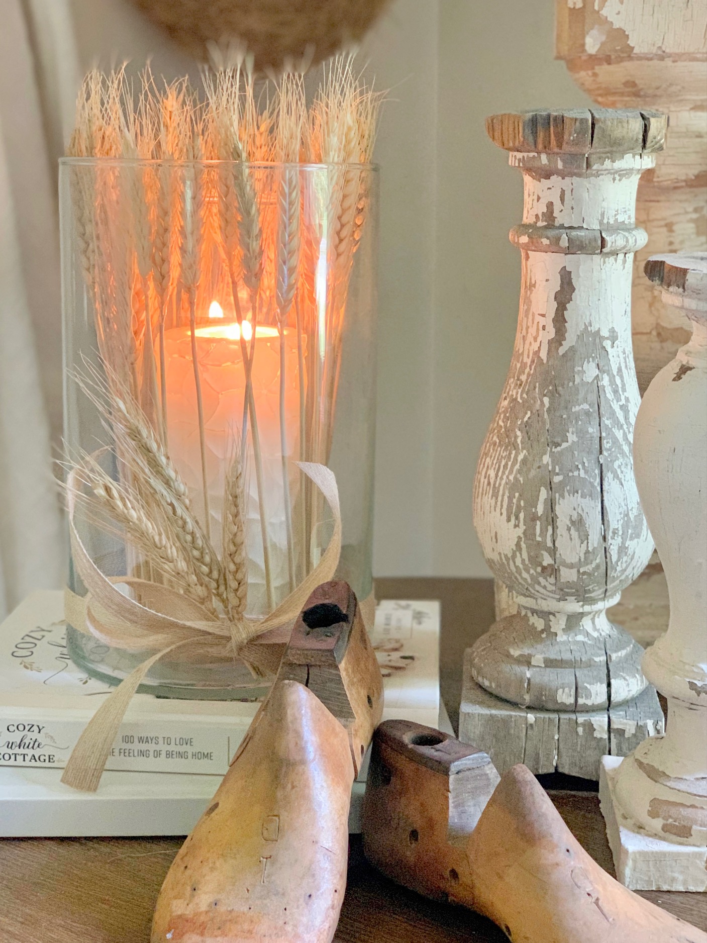 A closer view of the lantern with wheat.