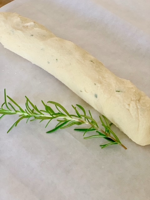 dough rolled into a log, ready to be placed in the freezer