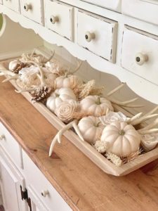 a farmhouse hutch with the dough bowl design on it.