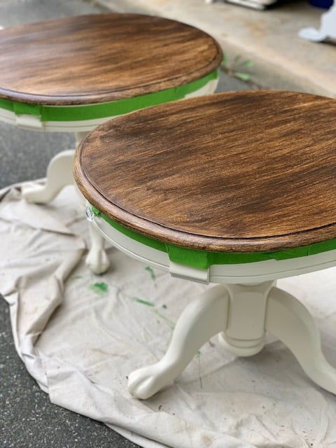 two table with two coats of antiquing wax drying. 