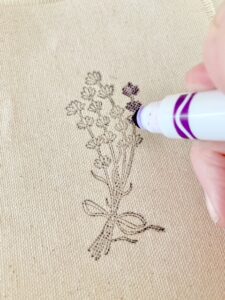 using a purple marker to color in the stamp to make it look more like lavender.