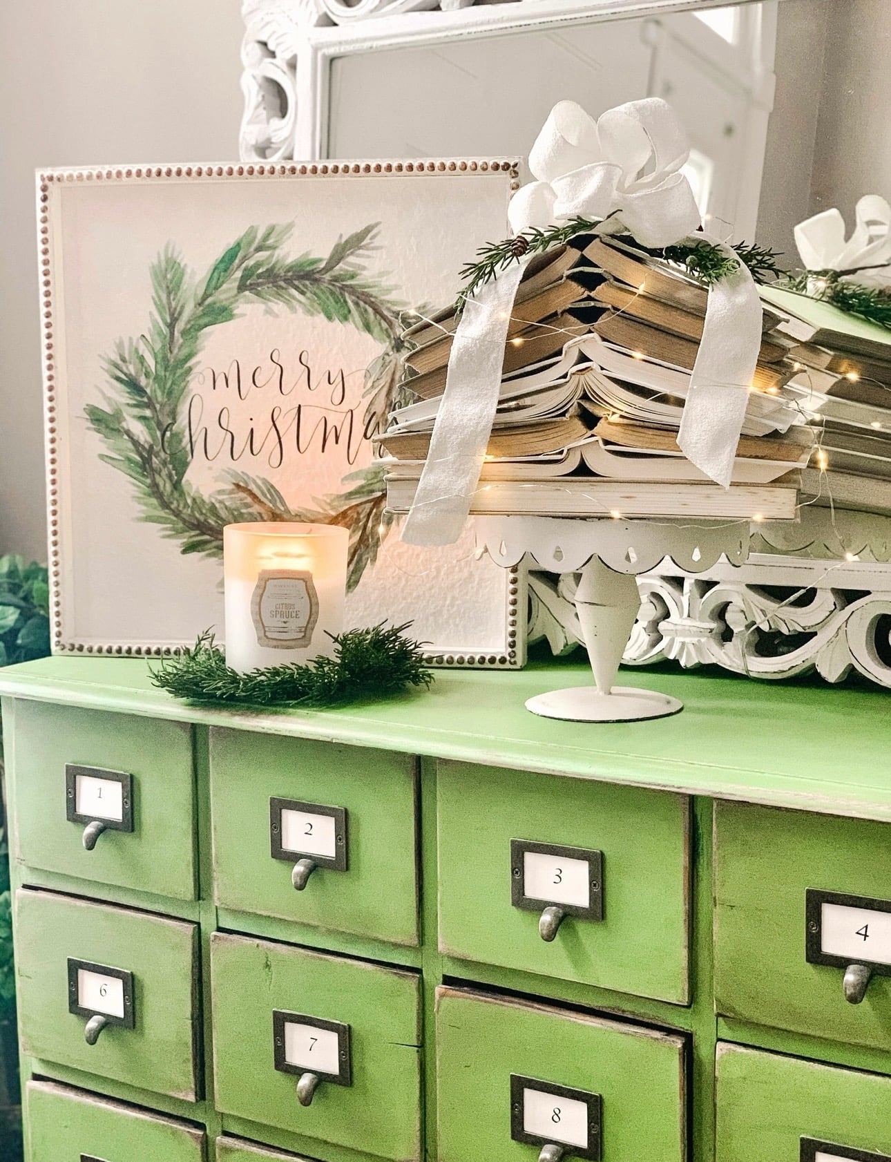 A vintage book tree on our green apothecary. 