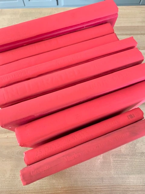 Painted books drying.