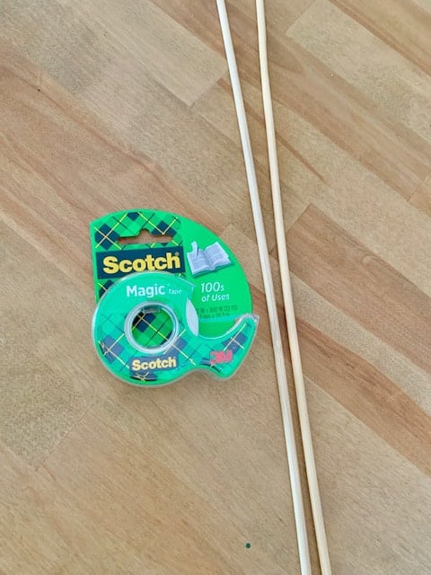 Tape and sticks for support.