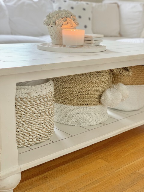 baskets under a coffee table
