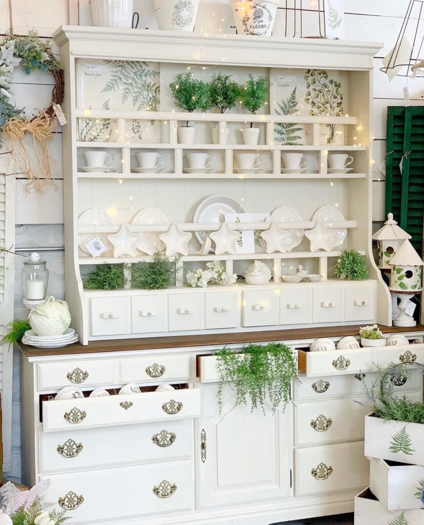 Dresser and open hutch in an antique white finish. 