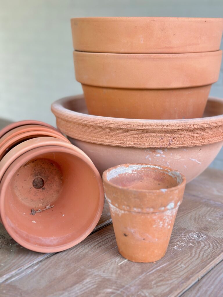 a stack of clay pots