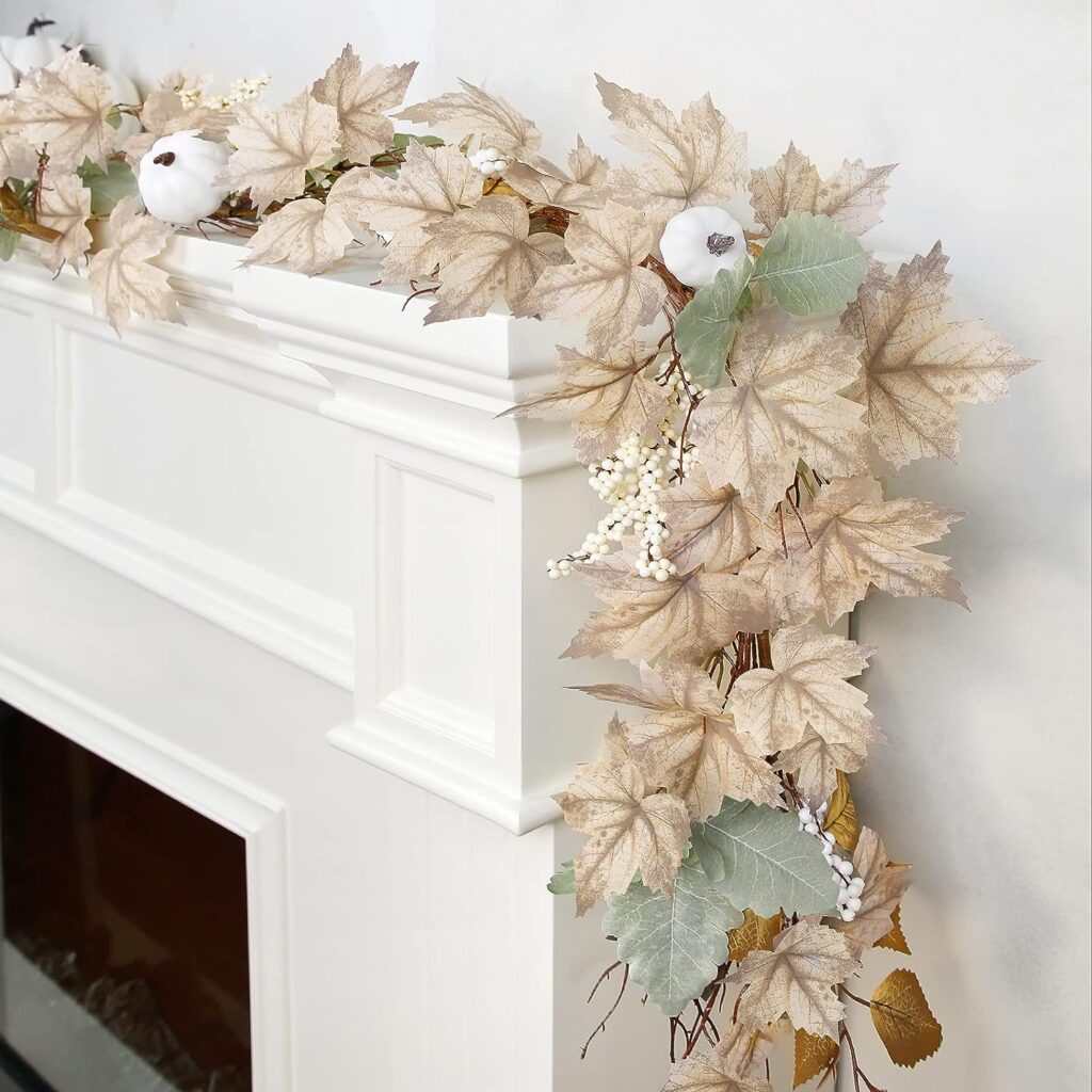pale cream maple leaves with white pumpkin, berries and light green leaves. 