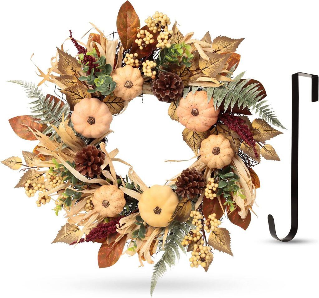 beautiful full wreath filled with berries, pinecones, soft color pumpkins, pine cones. this wreath comes with a hanger. 
