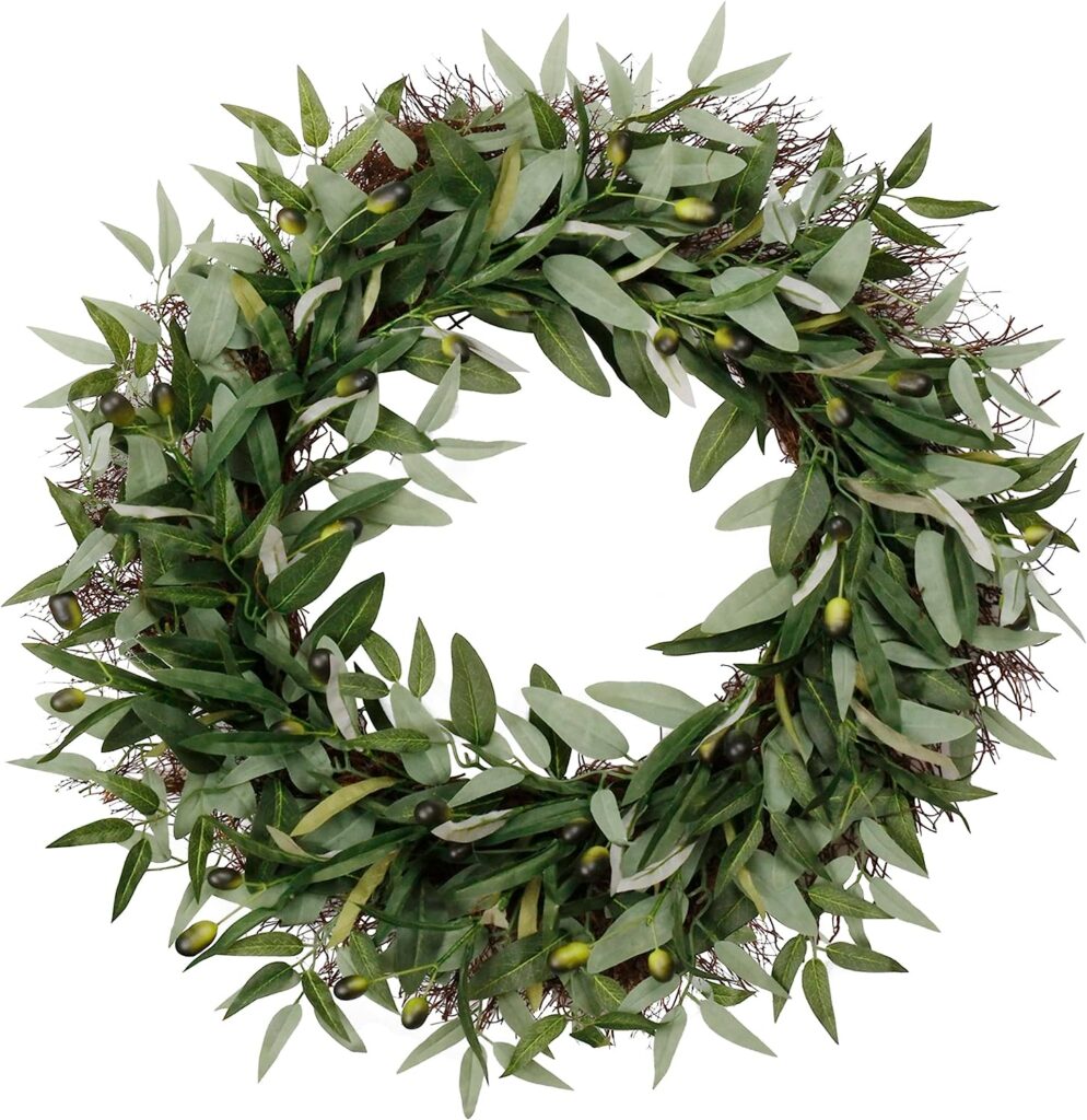 whispy small twig base wreath adorned with green olive branches with olives.