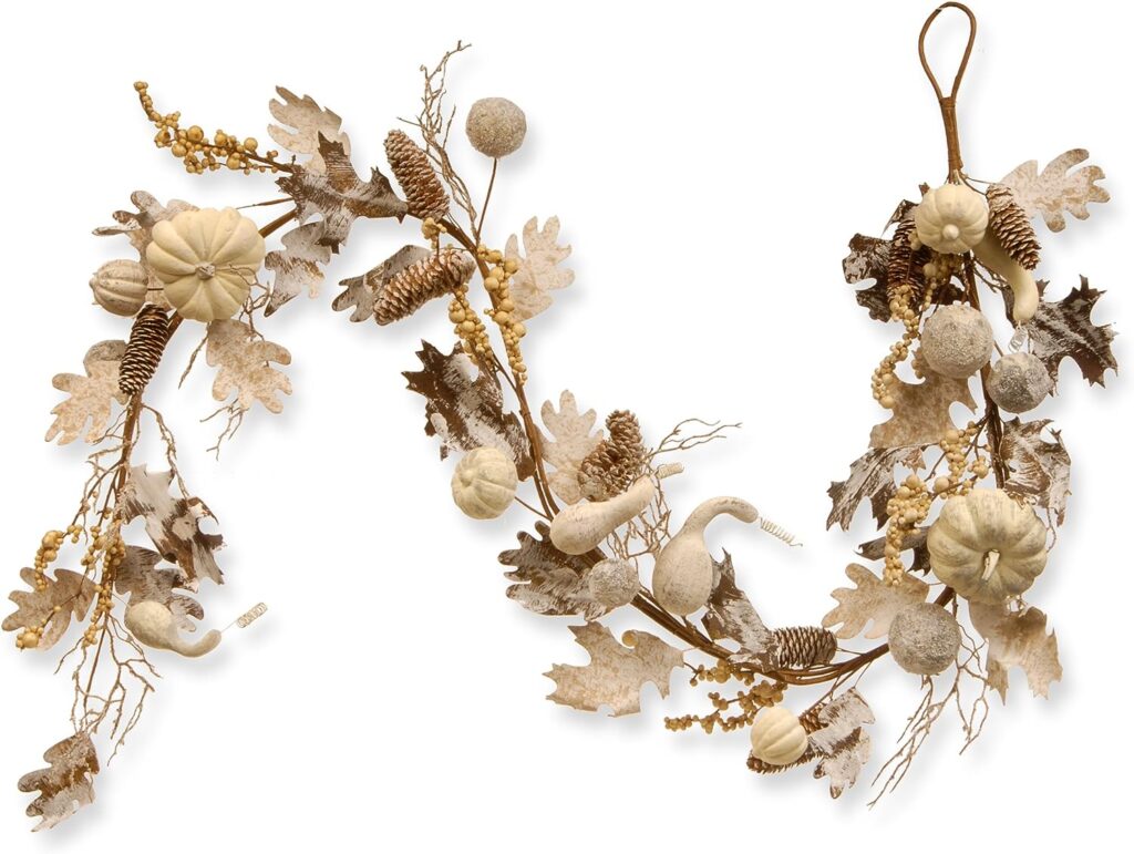a very neutral light garland with leaves, pine cones, twigs, pumpkins. 