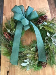 wreath with the base green ribbon.
