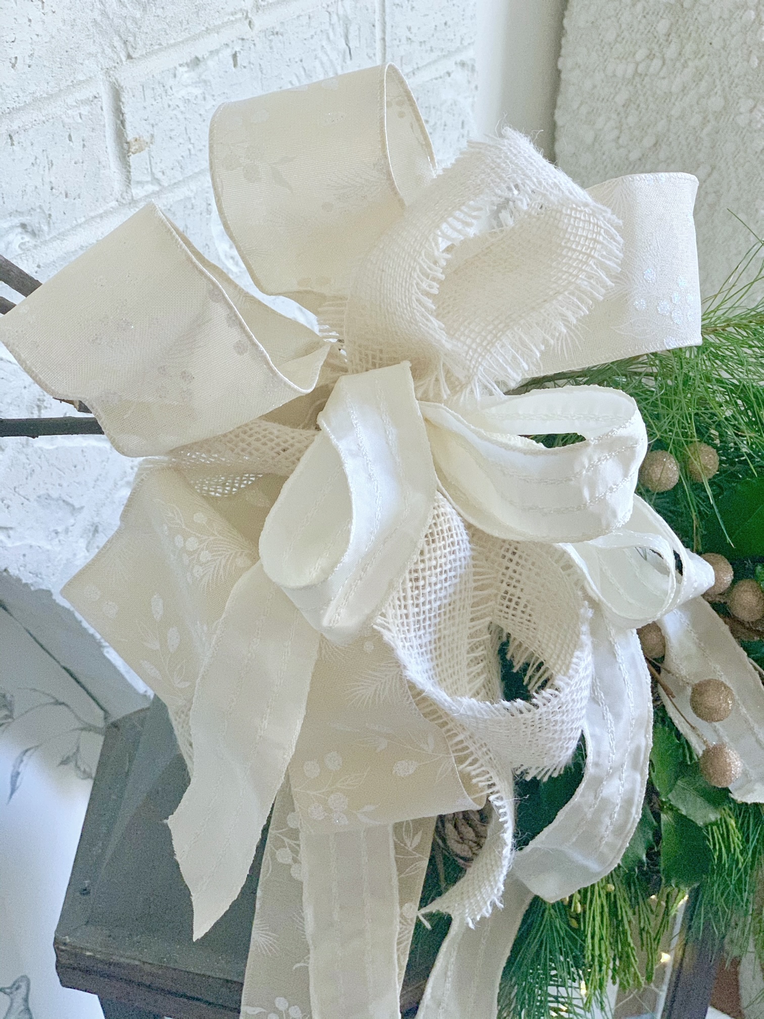 3 white ribbons of different textures for a monochromatic bow.