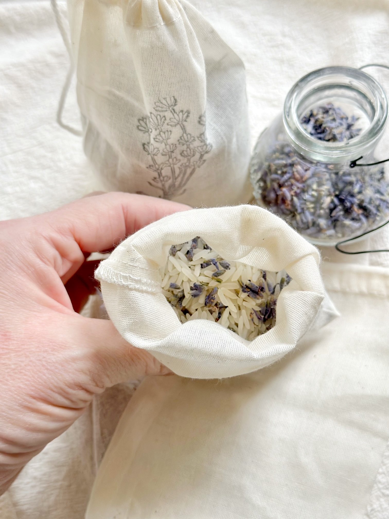 An open sachet showing the lavender and rice.