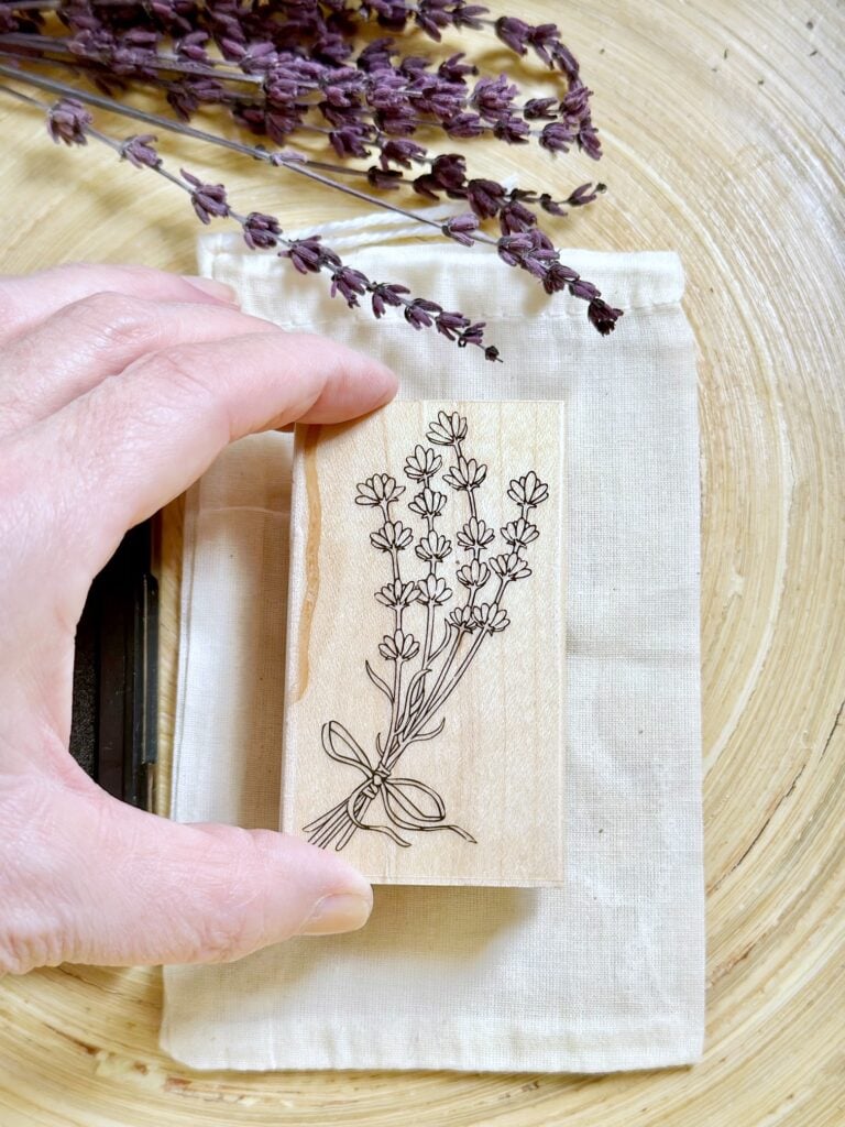 pressing the stamp on the bag.