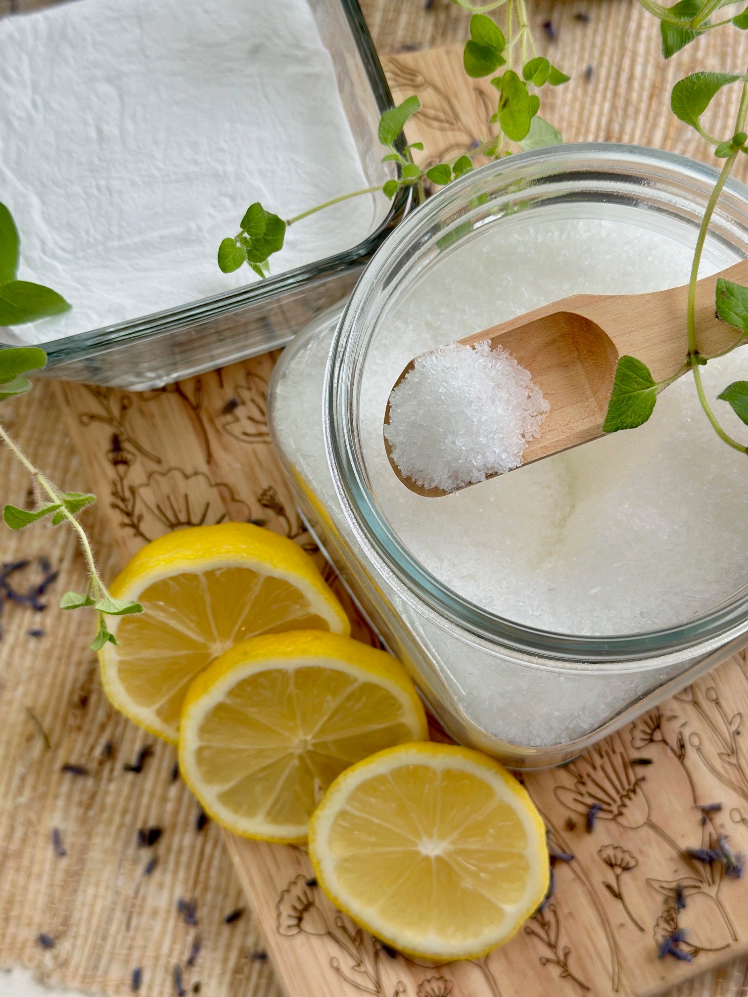 laundry scent booster with a wooden scoop. 