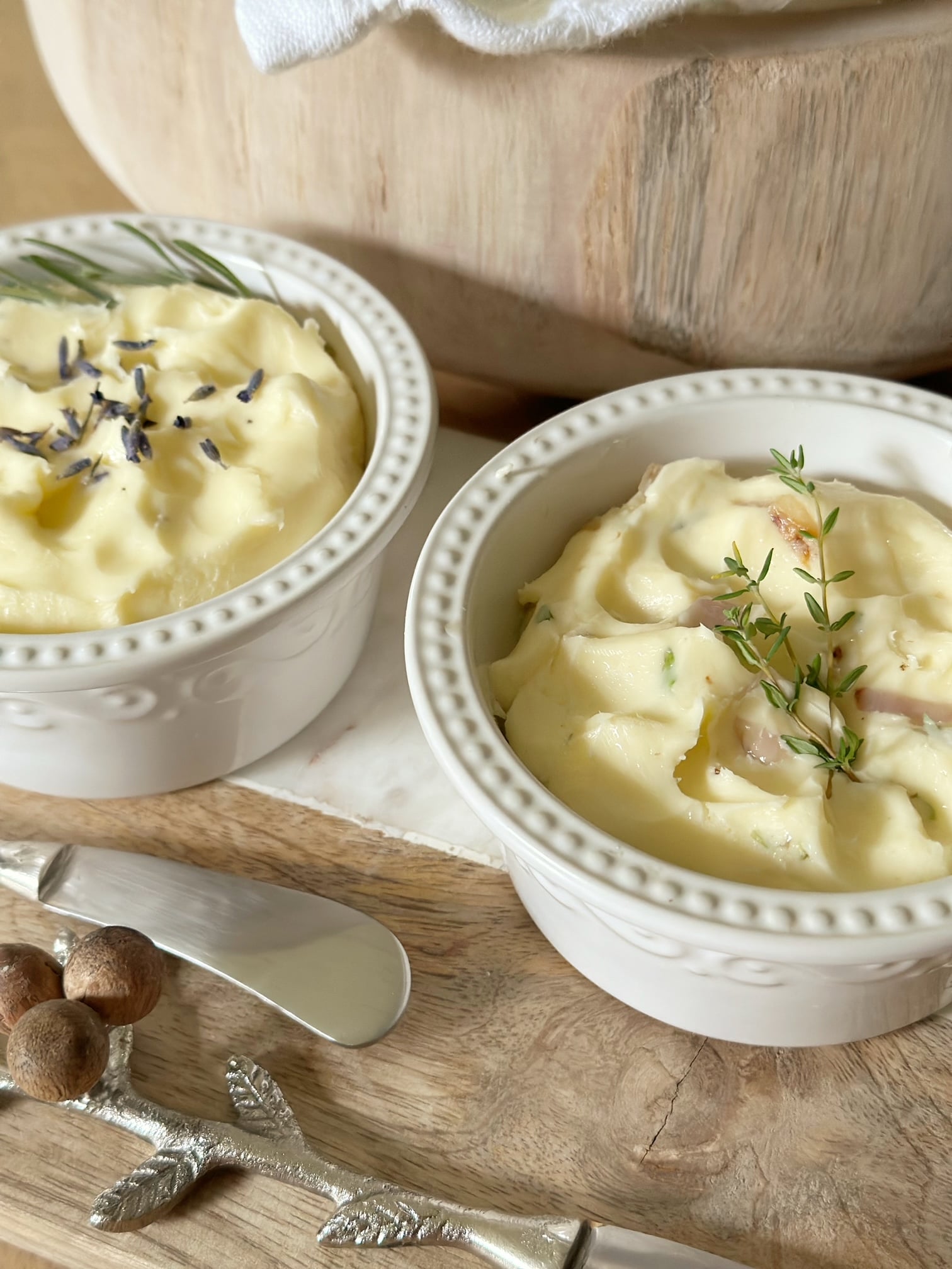 Close ups of two bowls of infused butter.