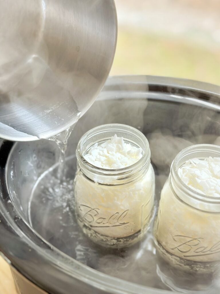 pouring boiled water in the crockpot. 