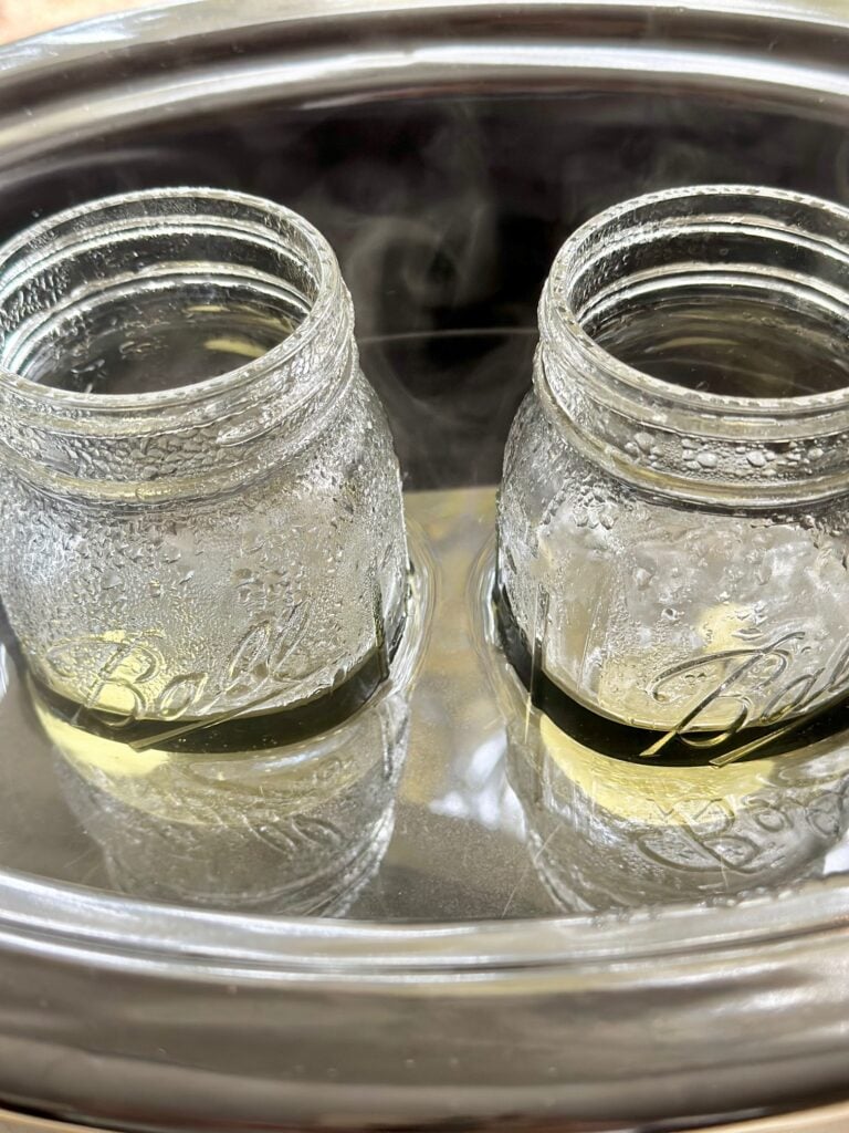 The wax melted and reduct=ed to ½ of the jar. 