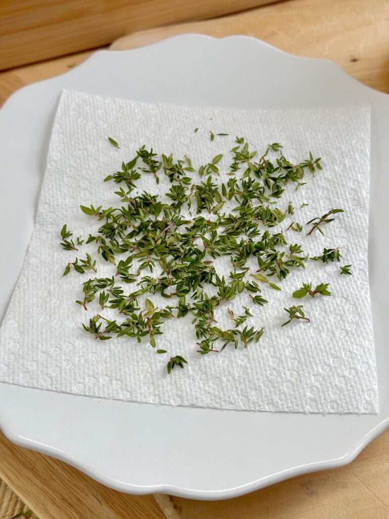 Thyme on a paper towel before going in the microwave. 