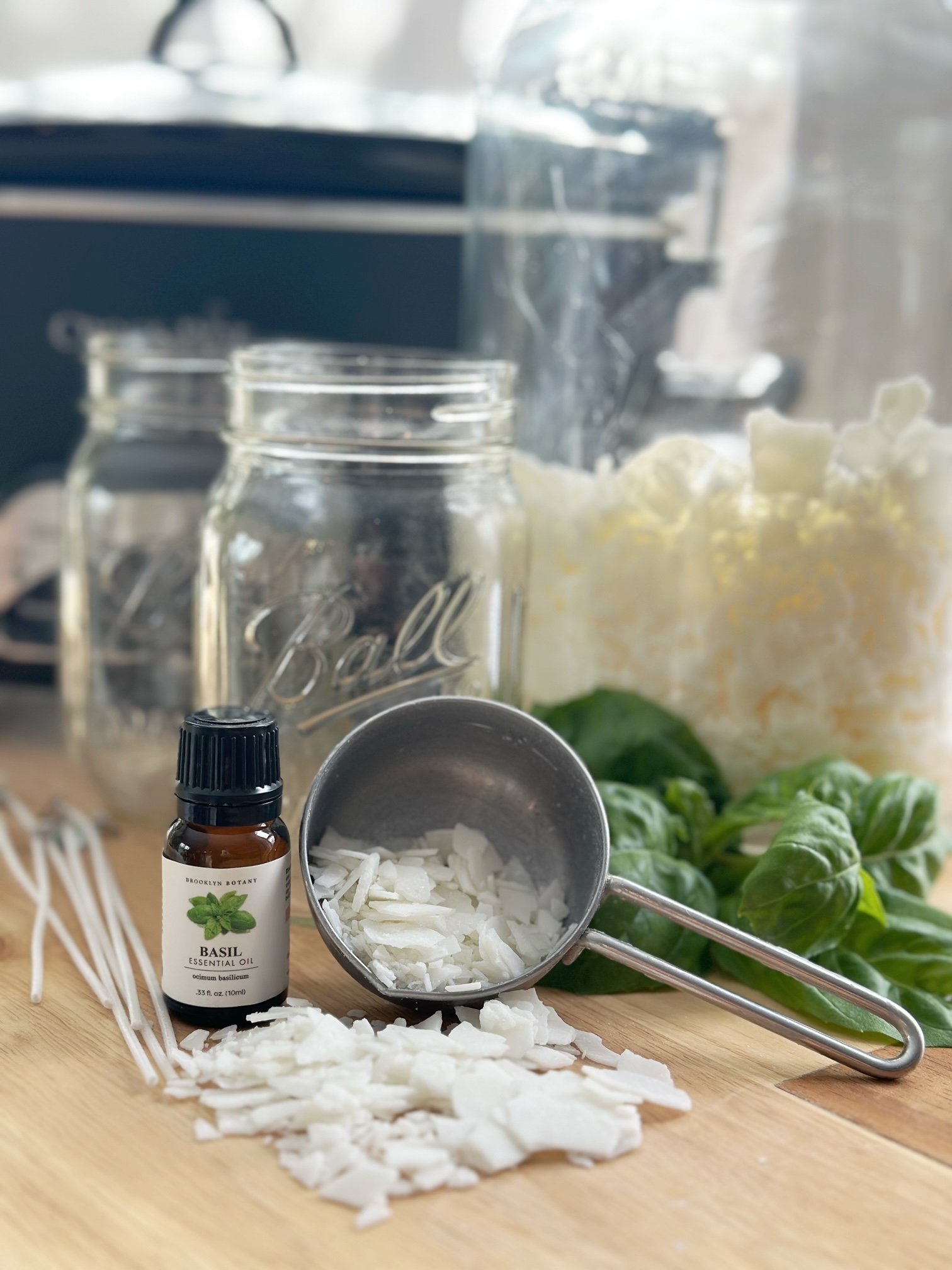 Crockpot, jars, basil oil, wax, wick. 