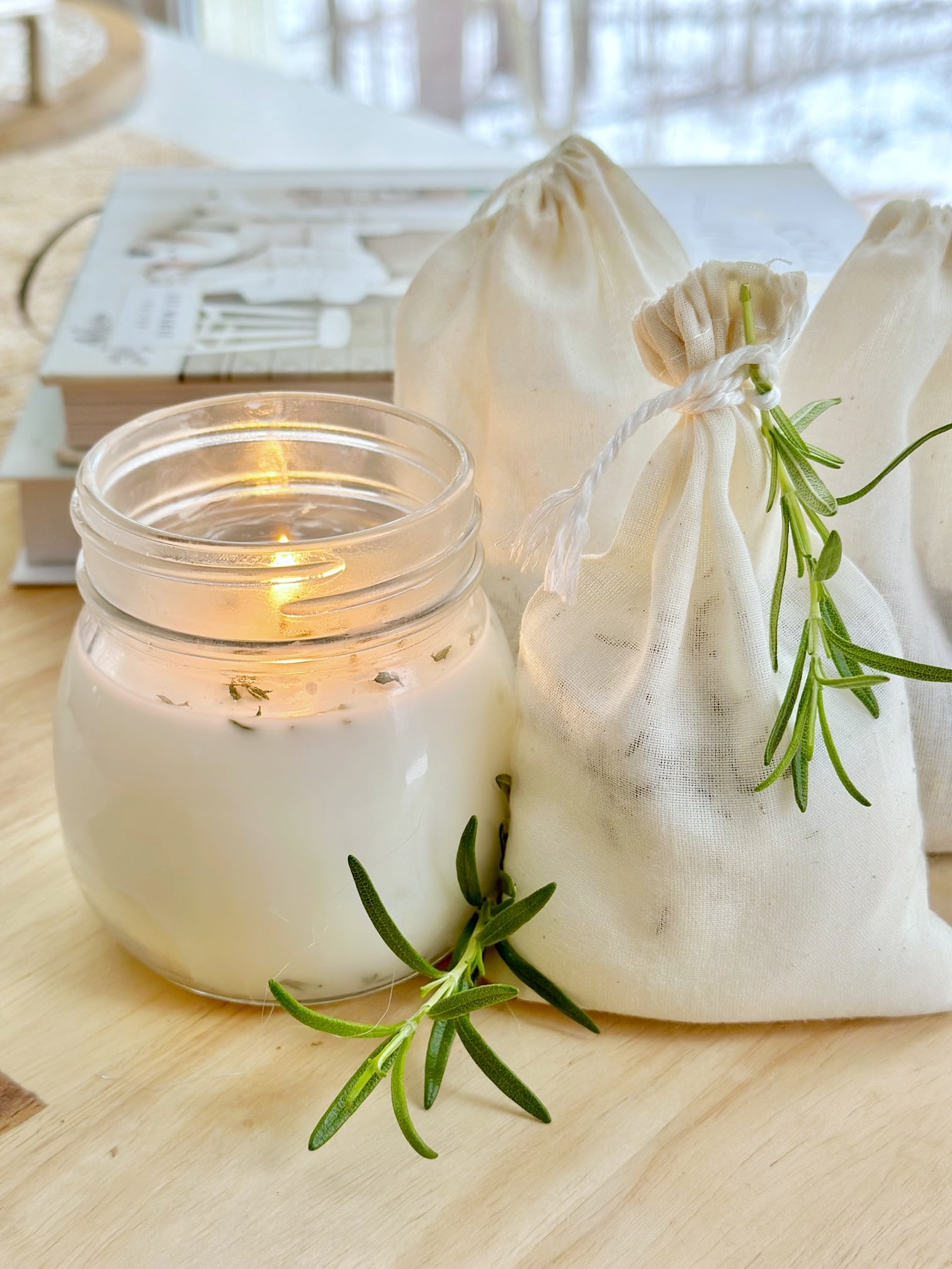 A rosemary sachet with a candle. 