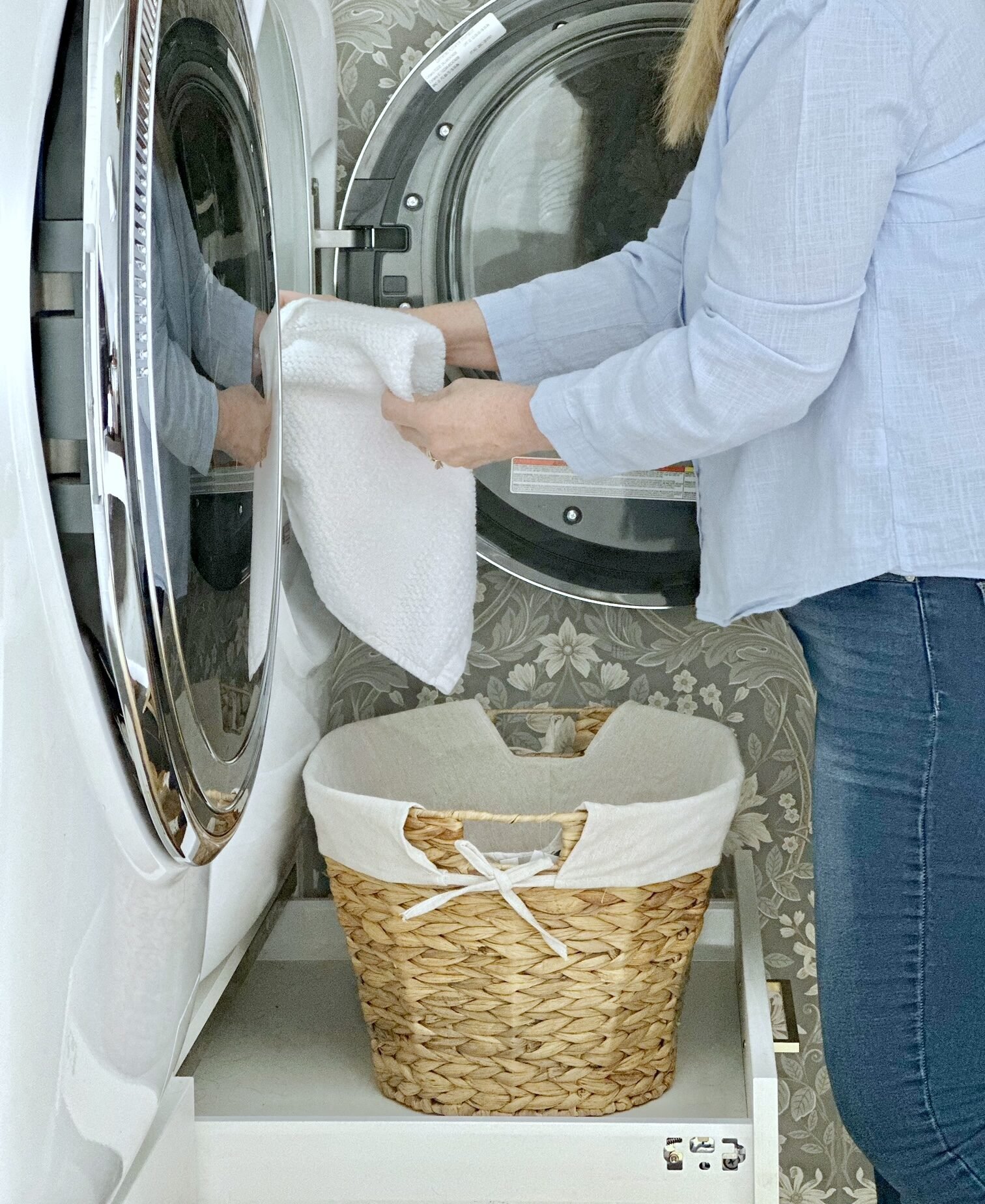 me putting laundry in the washer machine.