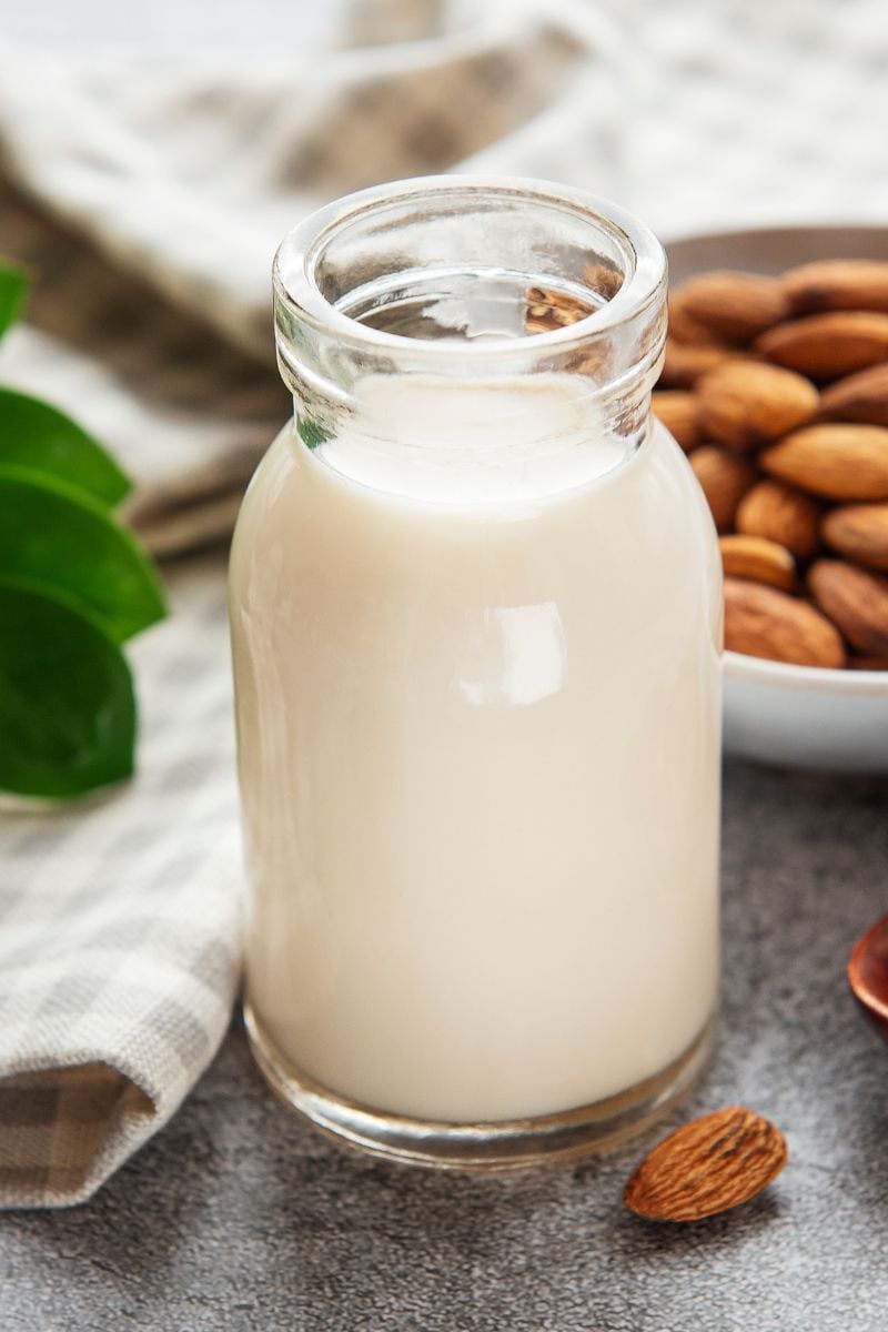 a glass bottle of almond milk. 