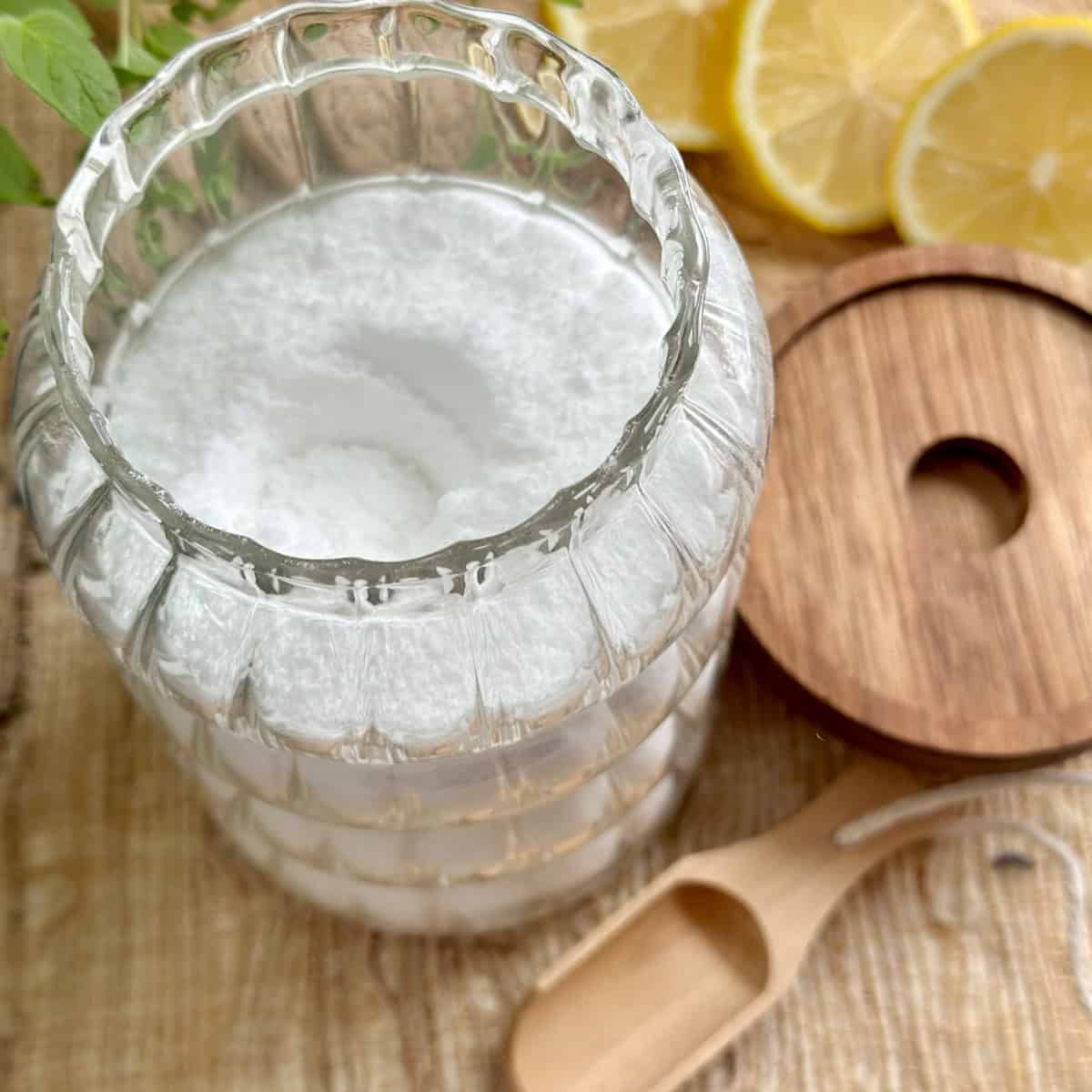 White laundry booster in a glass jar.