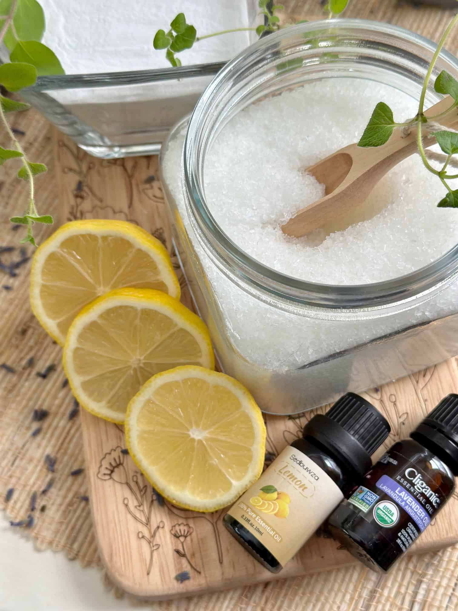 Epsom salt, baking soda, essential oils, with lemons.
