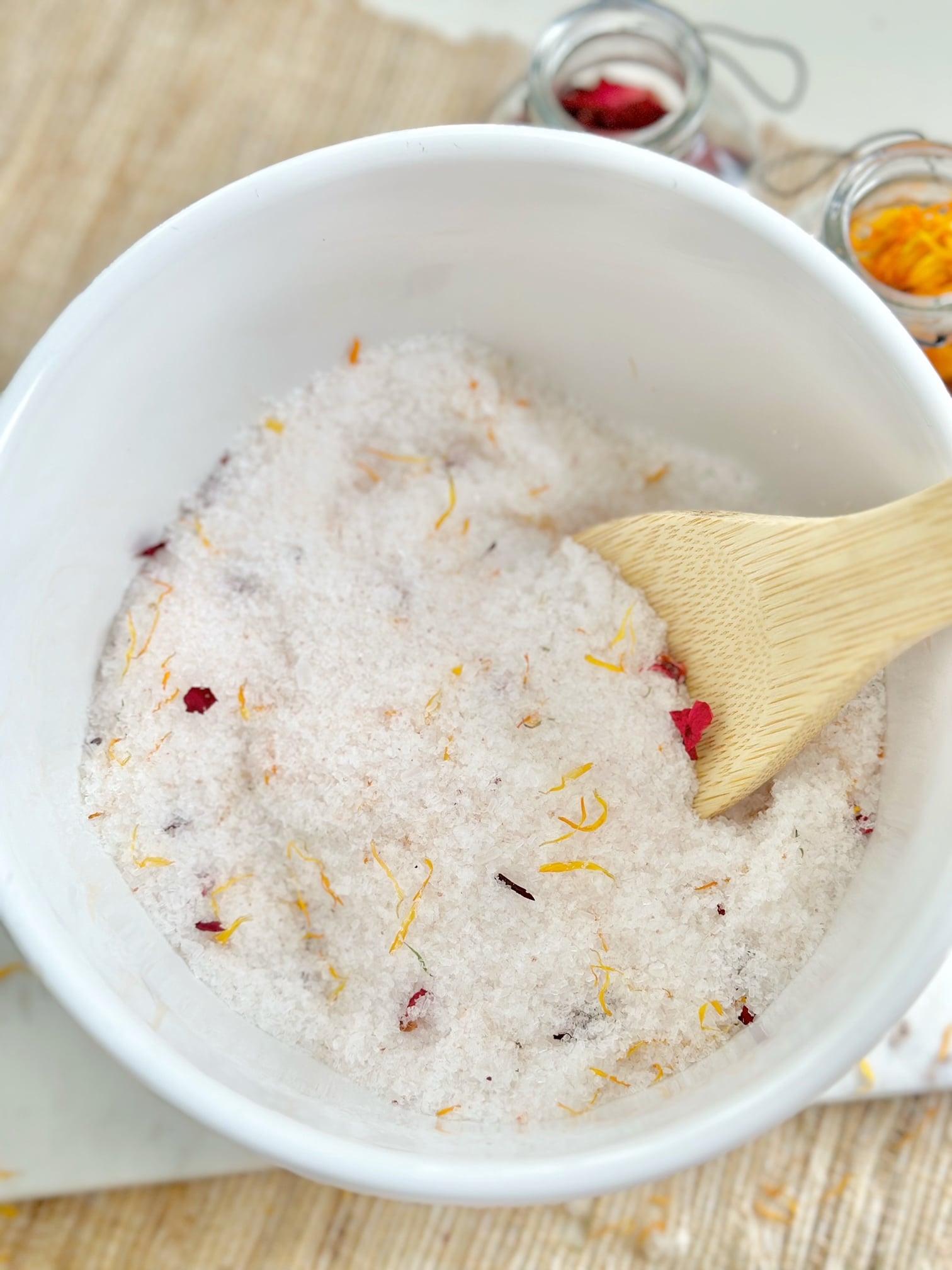 bowl with bath salt ingredients being mixed.