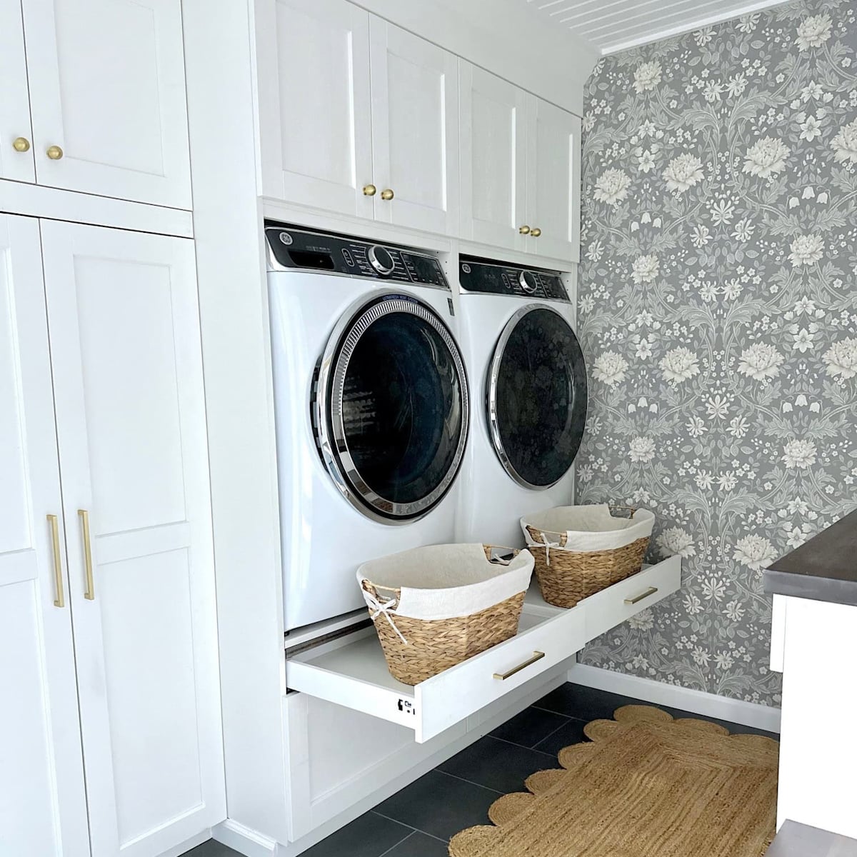 Ikea laundry room using white ikea kitchen cabinets to create a built in look.