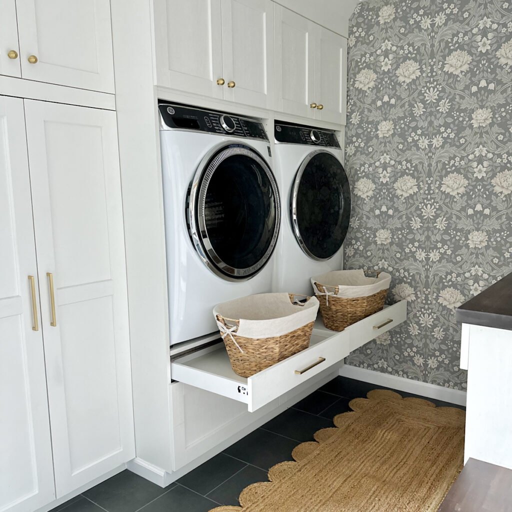A view of the washer and dryers in an ikea cabinet wall.