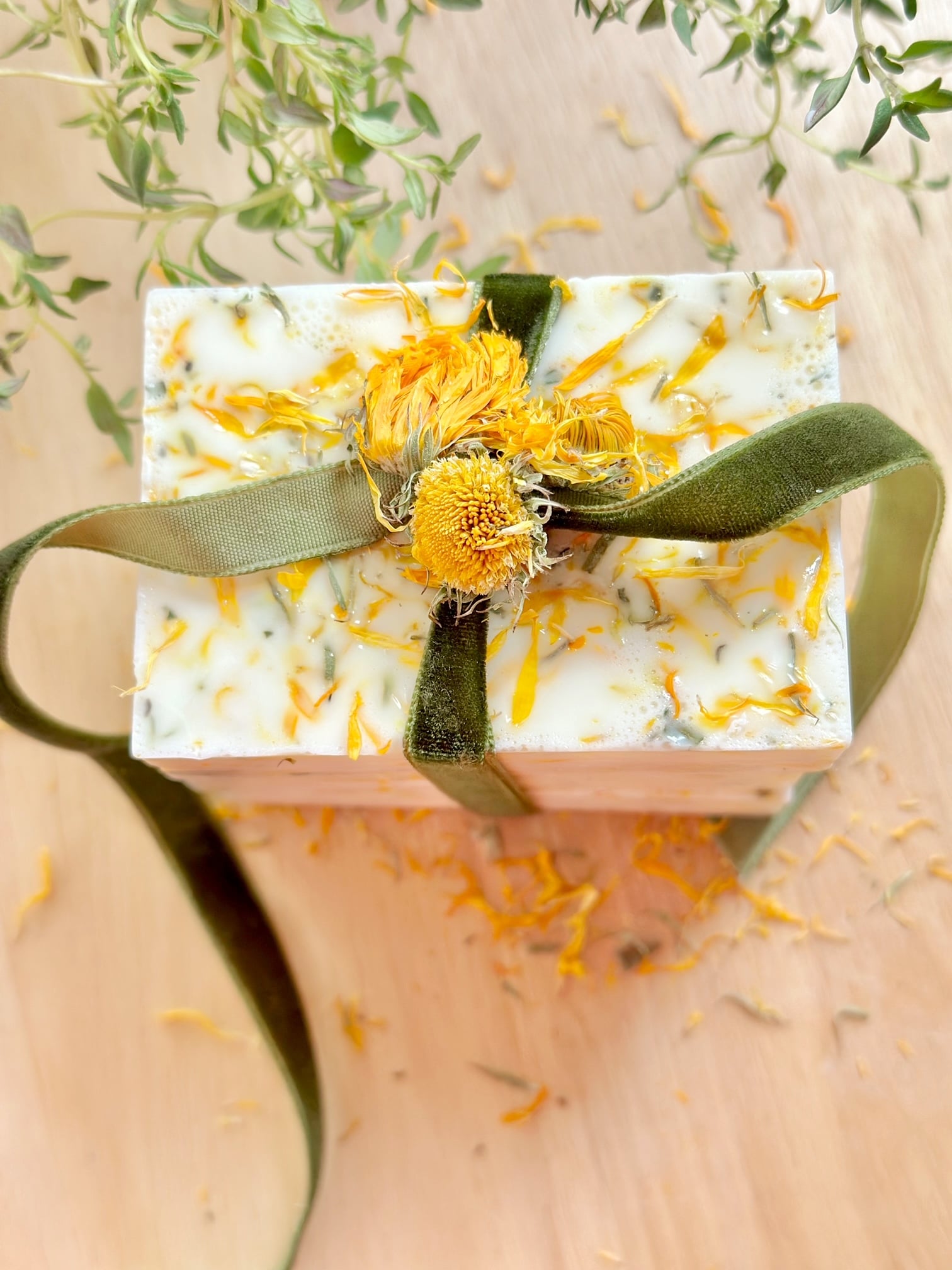 Top view of a stack of soap with velvet bow. 