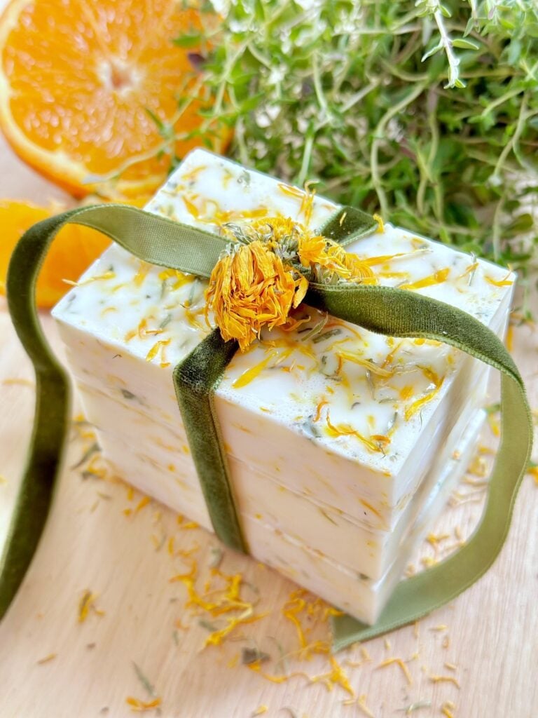 soap stacked and tied with a moss green velvet ribbon.