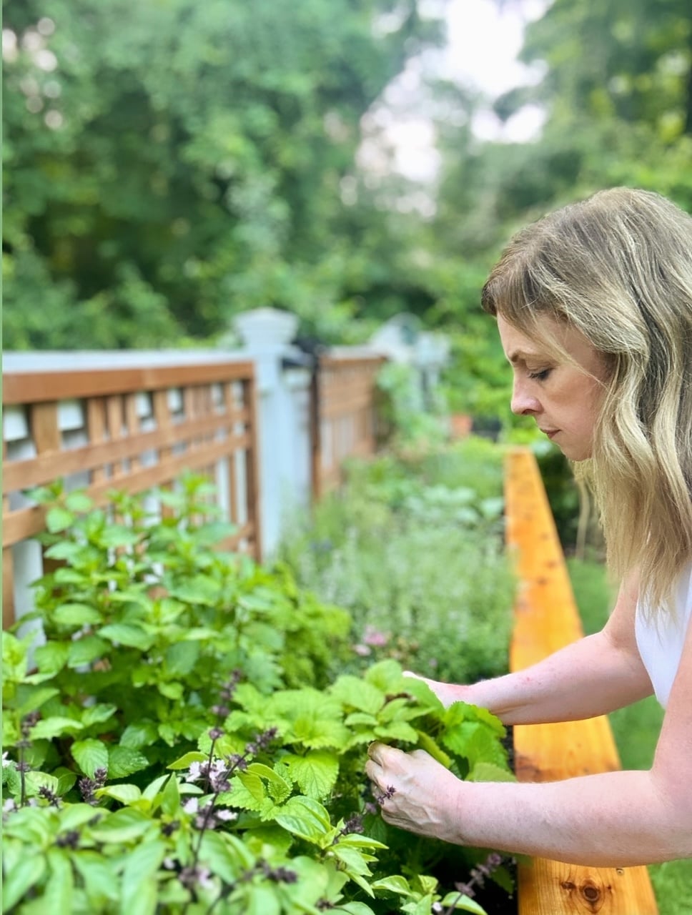 Me gardening in my raised bed. 
