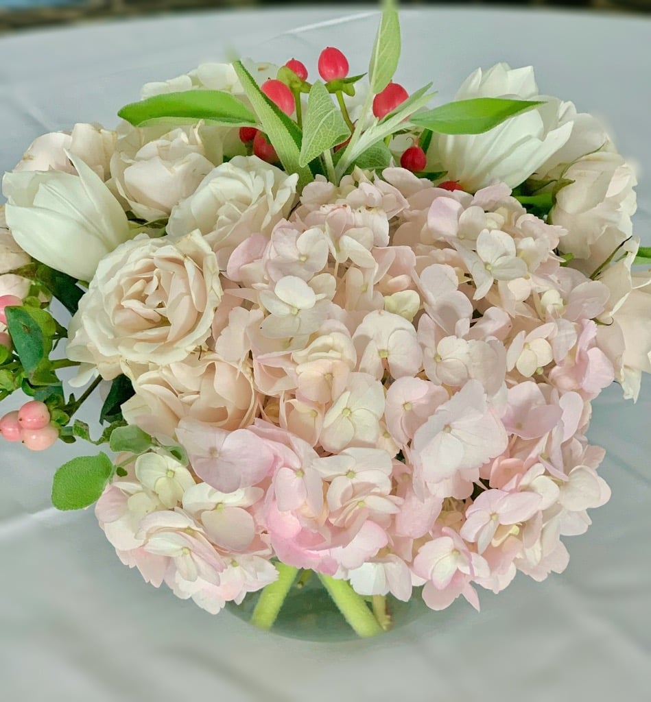 soft pink hydrangea, roses, tulips with sage.