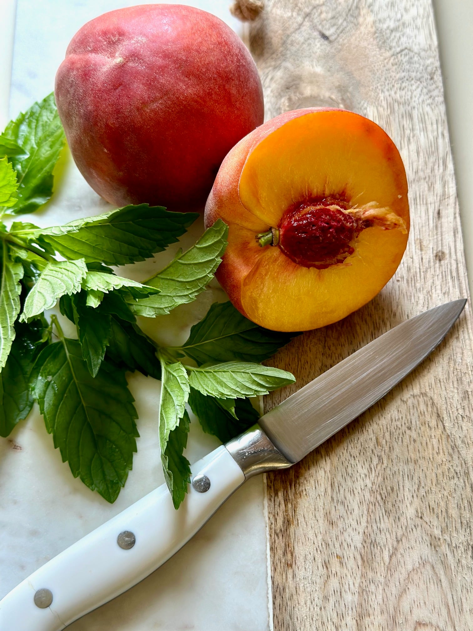 mint with sliced peaches.