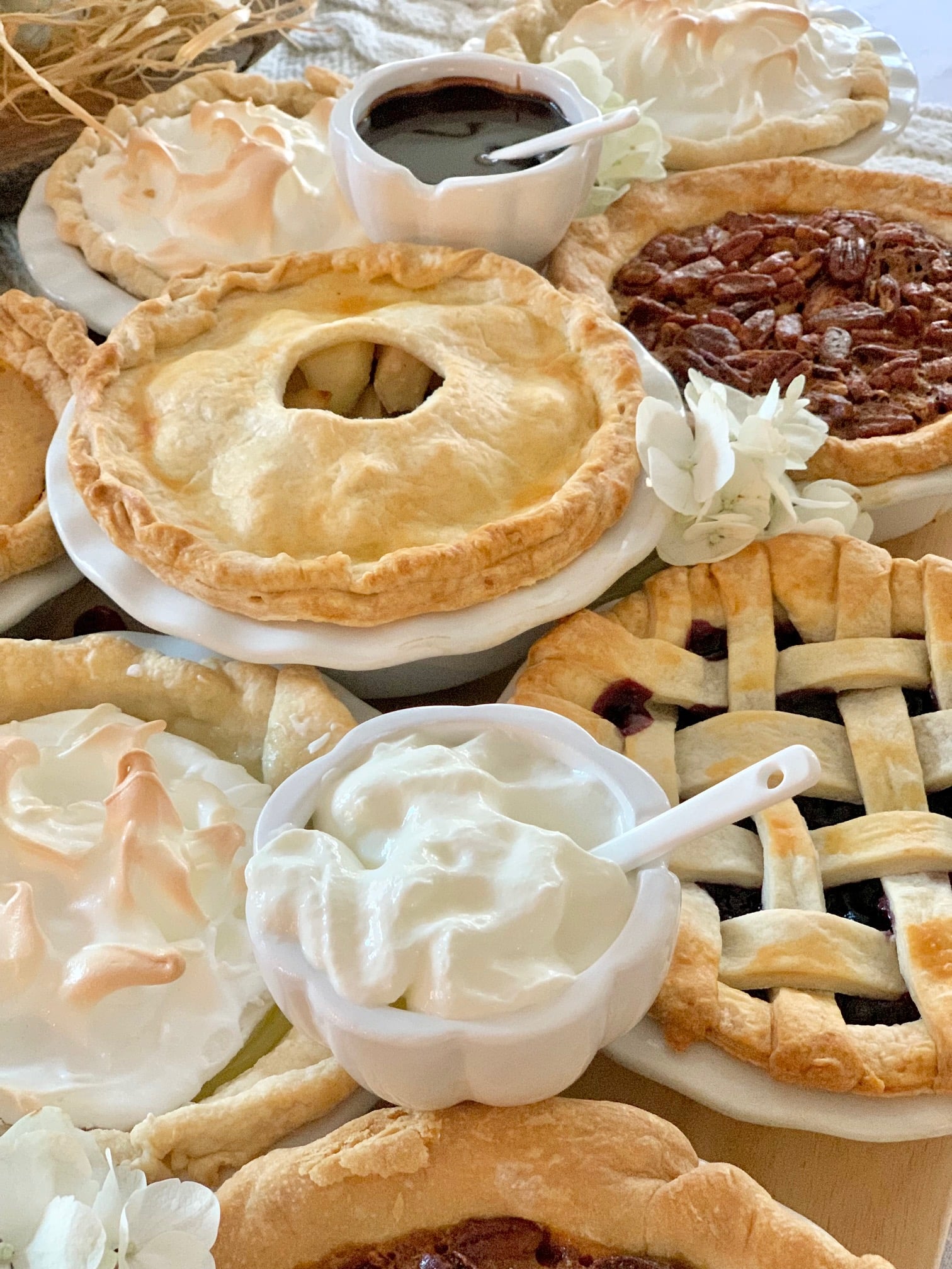 Mini pies displayed on this a pie board. 