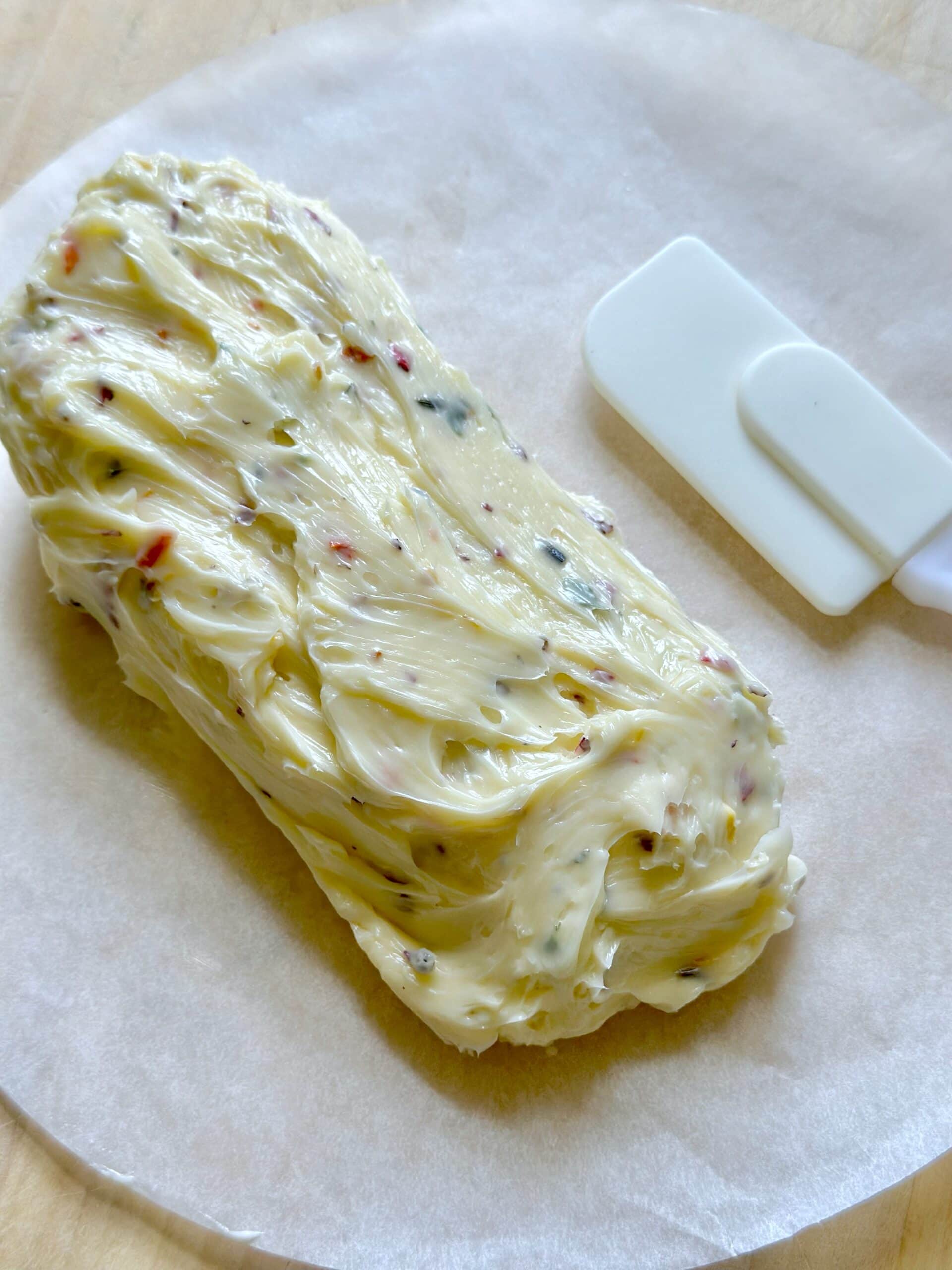 Mixed butter shaped into a log.