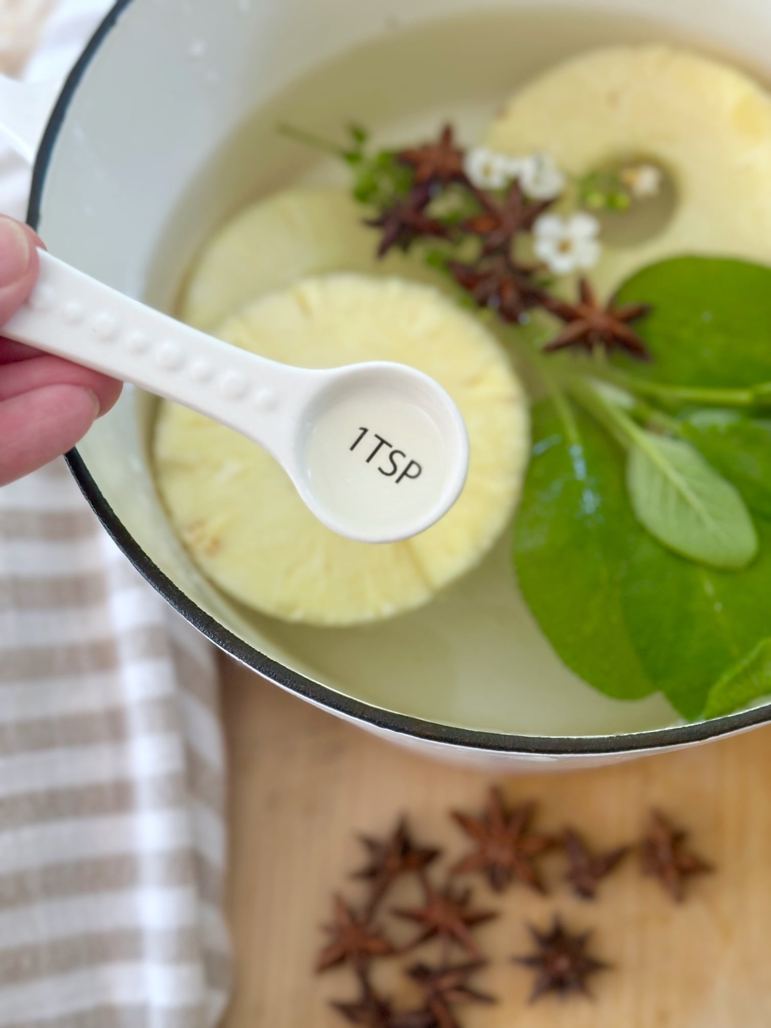 Pineapple rings, sage and star anise for this simmer pot recipe.