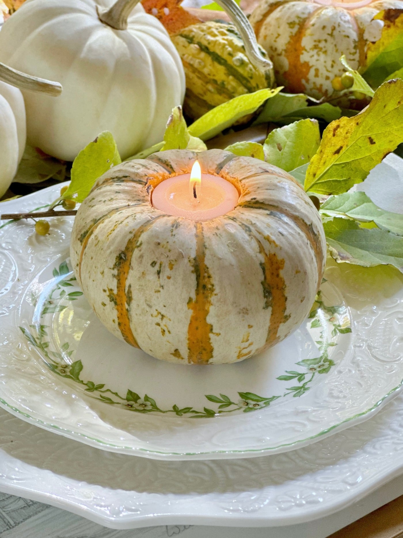 Another view of the pumpkin candle on the place setting.