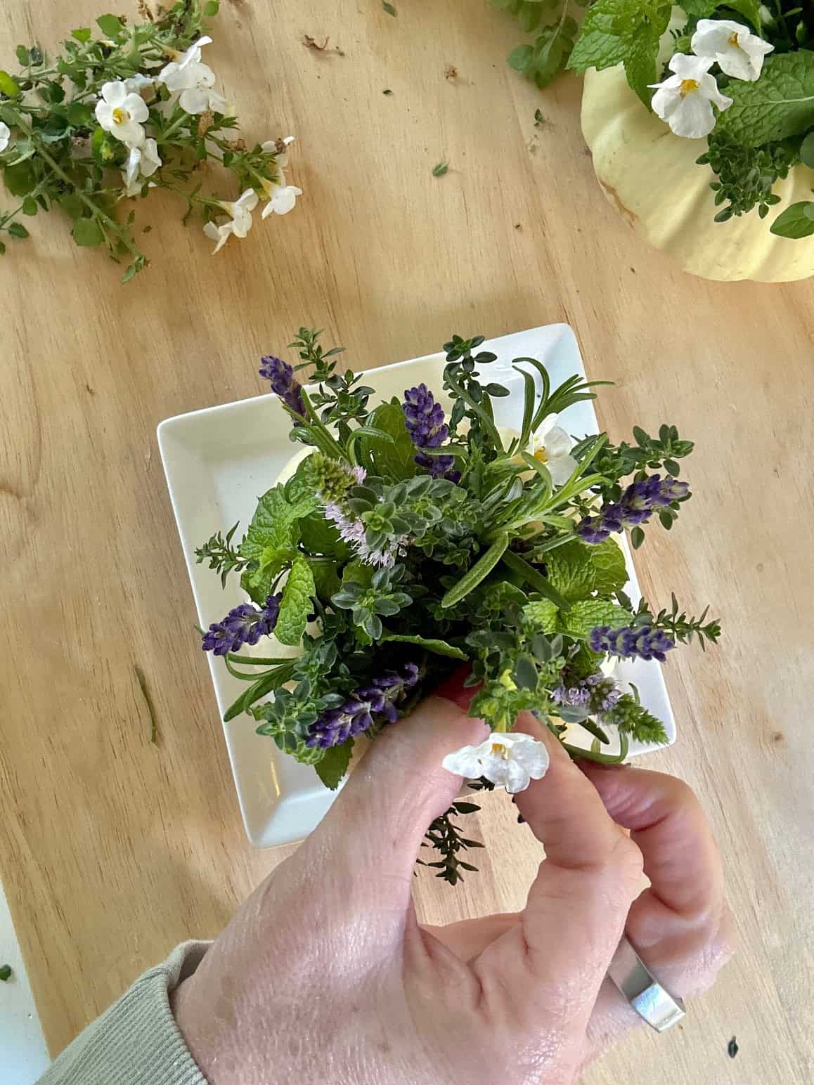 Adding the focal herbs and flowers.