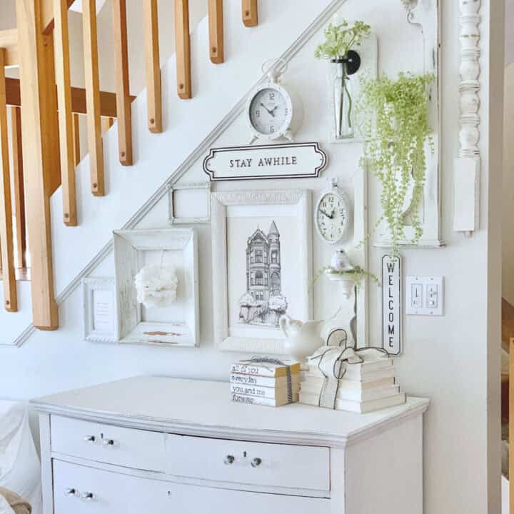 A beautiful vintage-inspired wall collage. The collage is mostly white with touches of black.