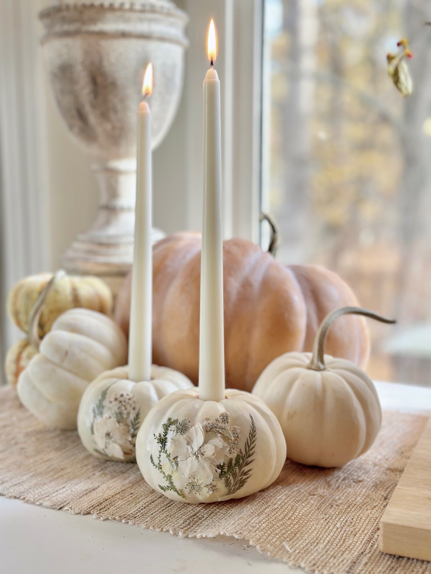Displaying pressed flower pumpkins in my dining room.