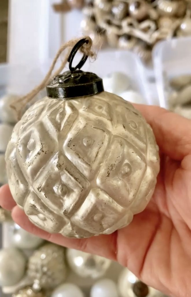A beautiful soft gold embossed ball ornament.