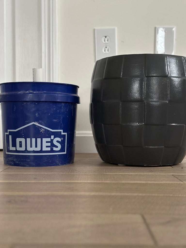The size of the 1 gallon bucket next to the black planter.